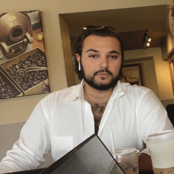 Apollon Papas working from a cafe